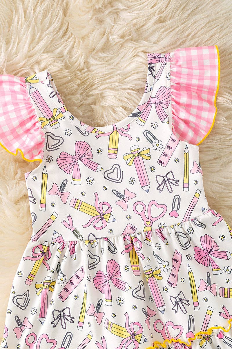 Coquette pencil printed on white back to school dress. DRG60853 JEAN: M