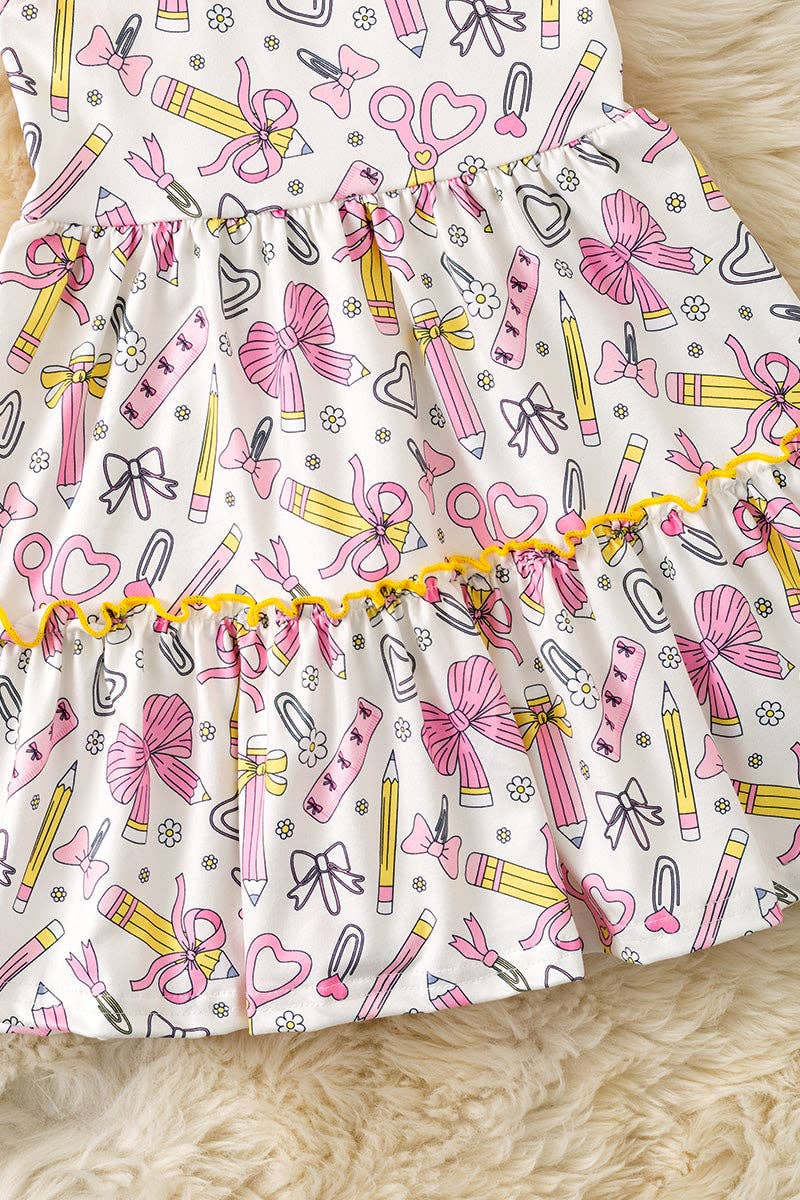 Coquette pencil printed on white back to school dress. DRG60853 JEAN: M