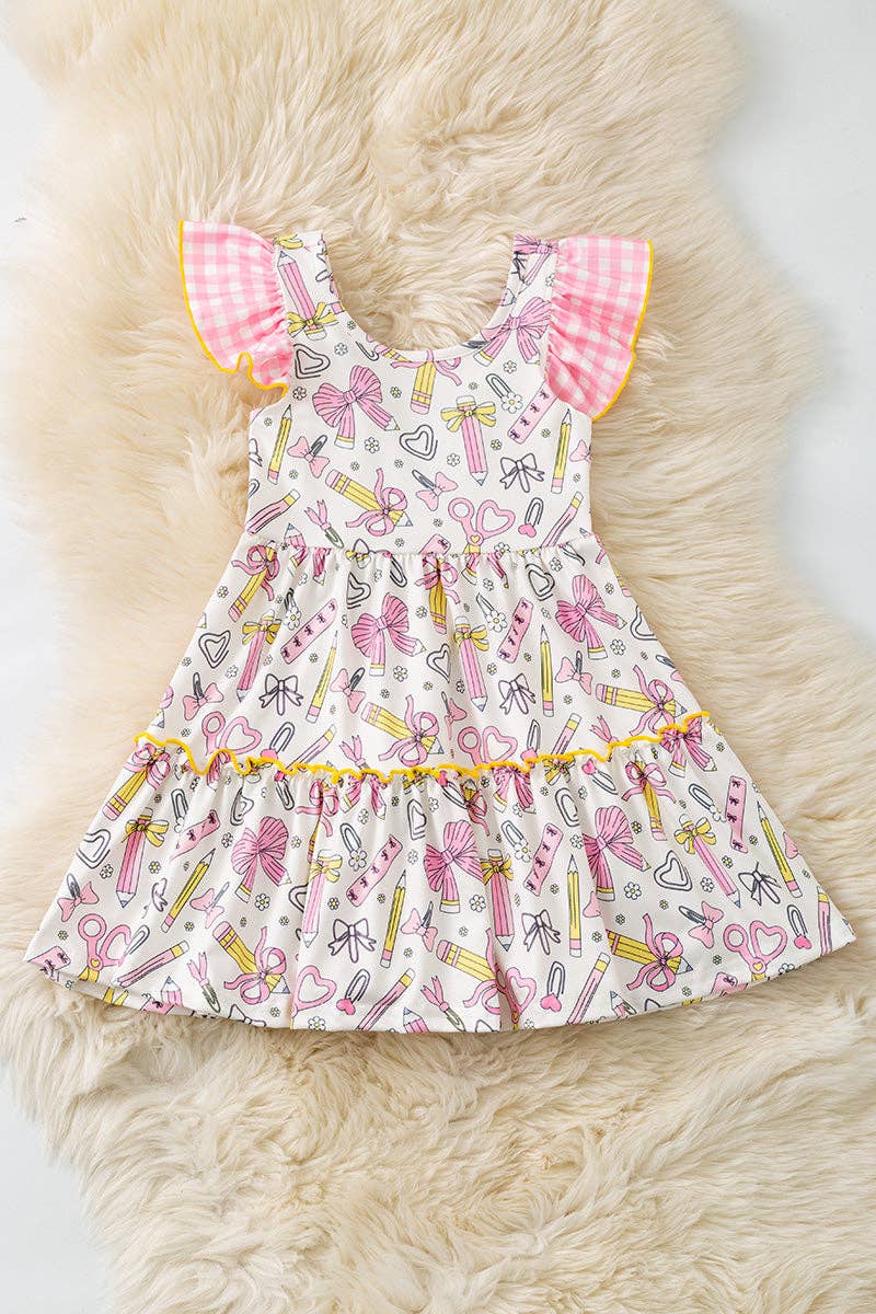 Coquette pencil printed on white back to school dress. DRG60853 JEAN: M